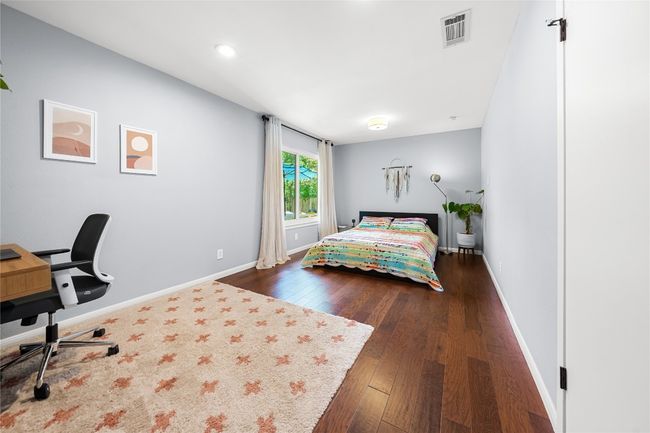Huge primary bedroom with window overlooking backyard! | Image 10