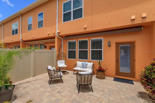 Private courtyard includes new 17 x 11 retractable awning | Image 17