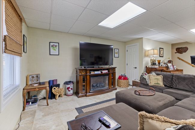 Den in the Basement is very spacious and has Half Bath | Image 36