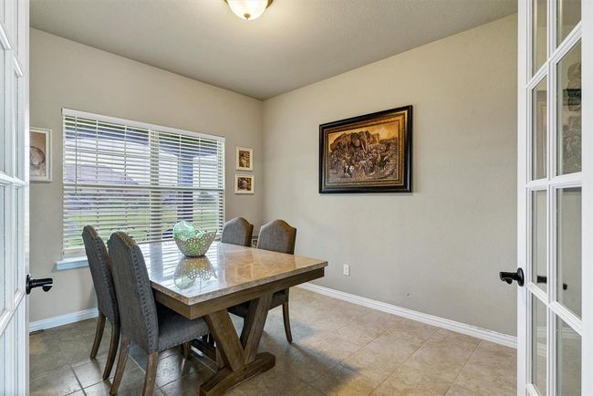 View of tiled dining area | Image 16