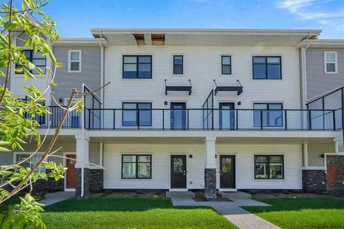 693 Savanna Blvd Ne, Townhouse with 4 bedrooms, 3 bathrooms and 2 parking in Calgary AB | Card Image