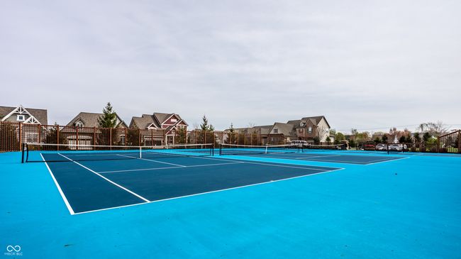 Amenities include multiple swimming pools, a fitness/workout center, playgrounds, a 15-acre park, dog park, racquet courts, a clubhouse w/ banquet facilities, miles of biking and walking paths and more! | Image 52