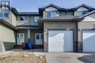 158 Hampton Close, Townhouse with 3 bedrooms, 3 bathrooms and 2 parking in Penhold AB | Image 1