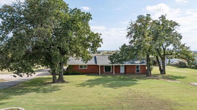 Ranch-style house with a front lawn | Image 3