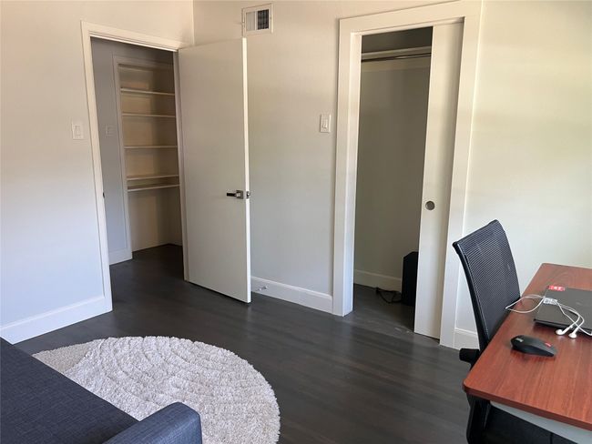 Guest bedroom 3 with closet currently used as an office | Image 18
