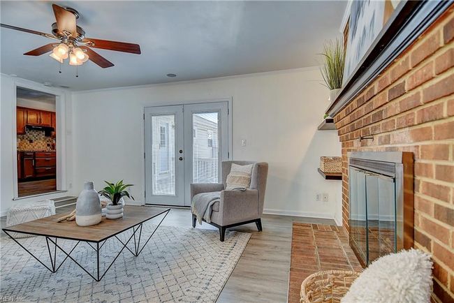 French doors lead to pool deck. | Image 17