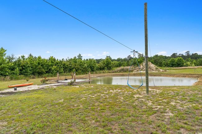 View of yard with a water view | Image 31