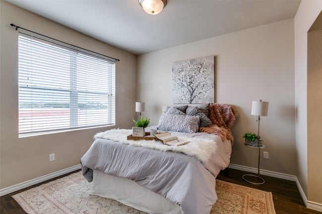 Bedroom featuring dark wood-style floors | Image 10