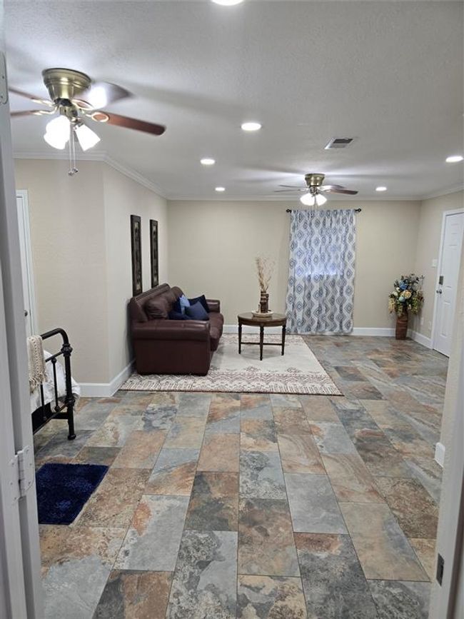 From utility door looking into Flex space that could be leased out, guest space, Mother in Law suite, Office or a second Primary. So many possibilities! | Image 36