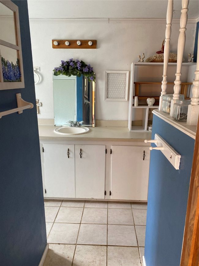 Bathroom featuring , tile patterned flooring, and sink | Image 22