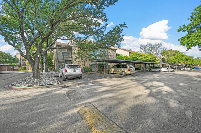 View of partially covered parking lot | Image 16