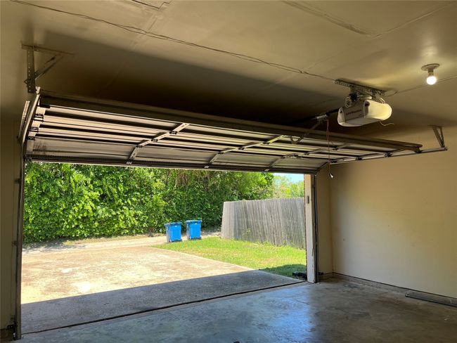Garage featuring a garage door opener | Image 16