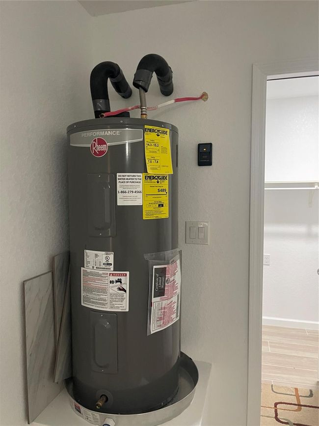 Hot water heater conveniently located in garage | Image 15