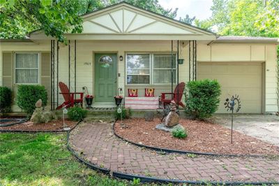 Single story home with a garage | Image 2