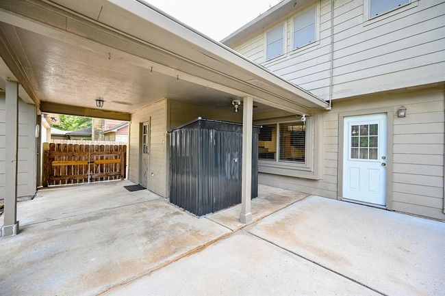 Covered breezeway and storage shed. | Image 30