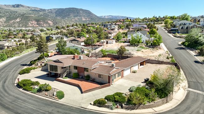 Aerial view of residential area featuring mountains | Image 54