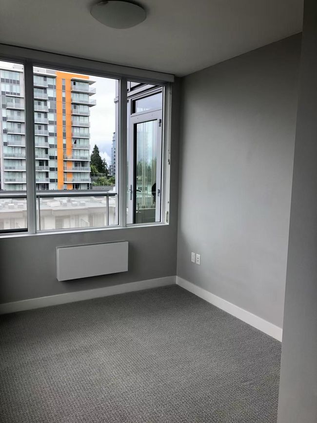 Empty room featuring carpet and baseboards | Image 5