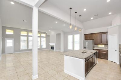 Kitchen open to the dining/living area (Digitally removed personal items) | Image 3