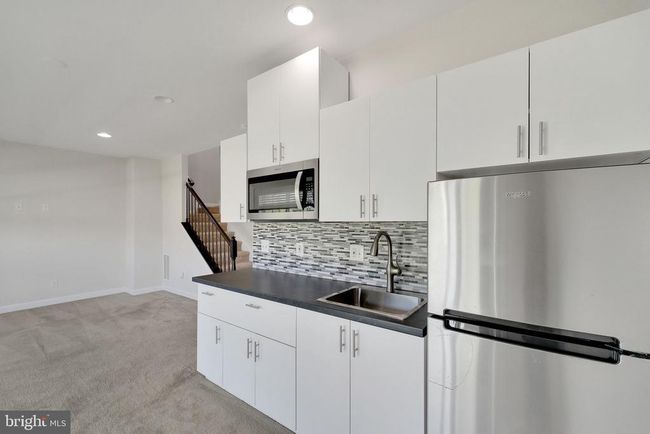 42510 Oak Park Sq, Townhouse with 3 bedrooms, 4 bathrooms and null parking in ASHBURN VA | Image 32