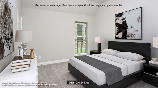 Bedroom with carpet floors and lofted ceiling | Image 6