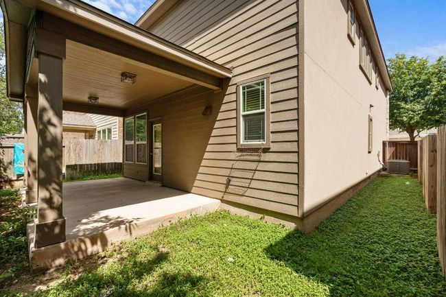 Fenced backyard featuring a patio | Image 31