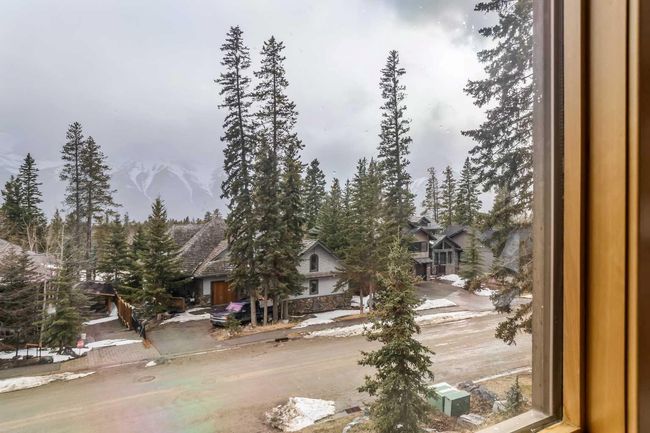 4 - 124 Silvertip Ridge, Home with 4 bedrooms, 3 bathrooms and 4 parking in Canmore AB | Image 34