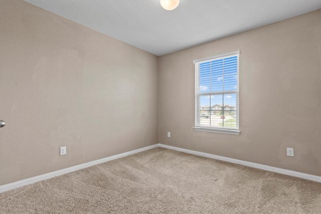 Empty room with carpet floors and baseboards | Image 15
