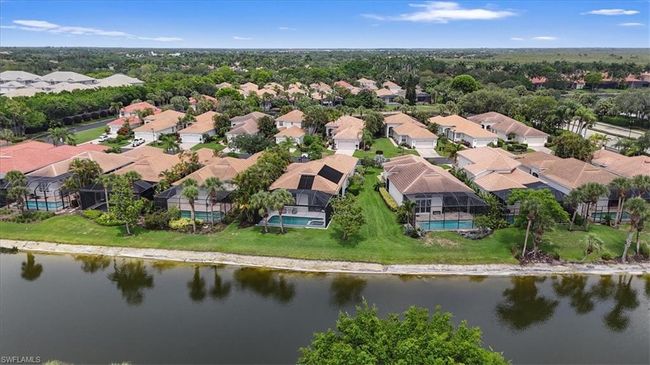 Aerial view of residential area with a nearby body of water | Image 37