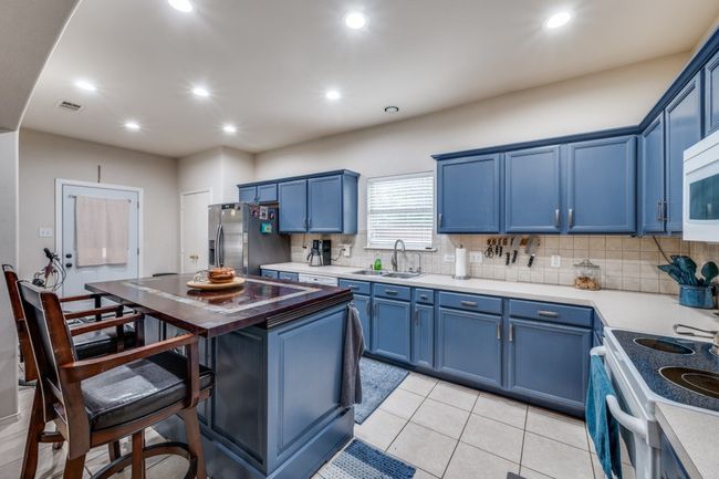 Kitchen with Island & recessed lighting | Image 7