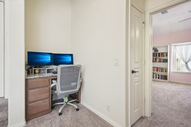 Office space with visible vents, baseboards, and carpet | Image 29