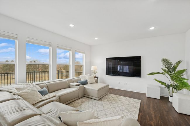 Your furniture will fit wonderfully in the spacious living room. | Image 8