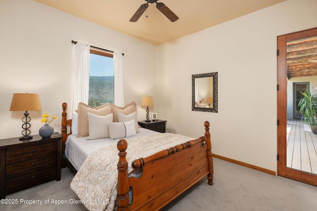 With pasture views and a private exterior glass door make this ensuite ideal for guests. | Image 19