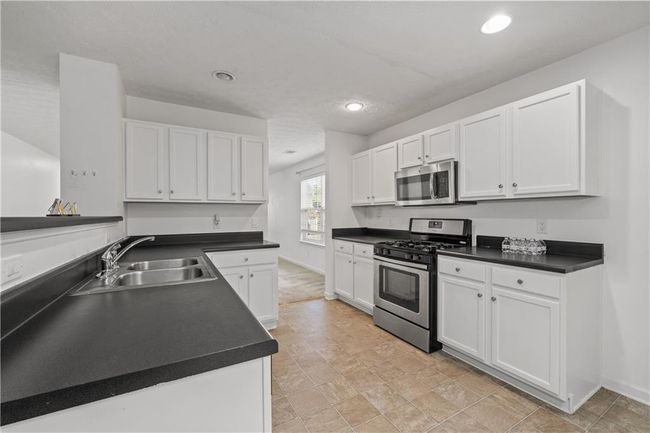 1218 Matt Moore Ct, House other with 5 bedrooms, 3 bathrooms and null parking in Lithia Springs GA | Image 19