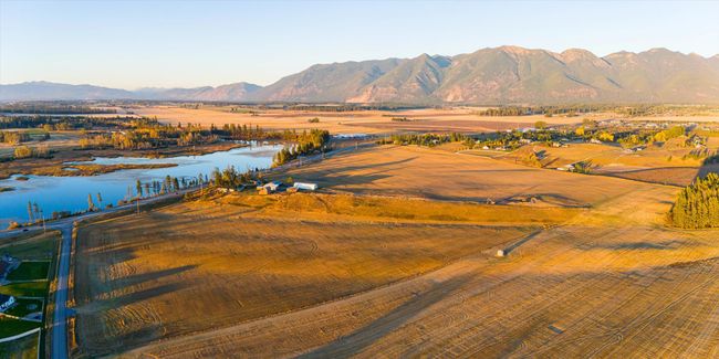 View of mountain feature featuring a rural view and a water view | Image 64