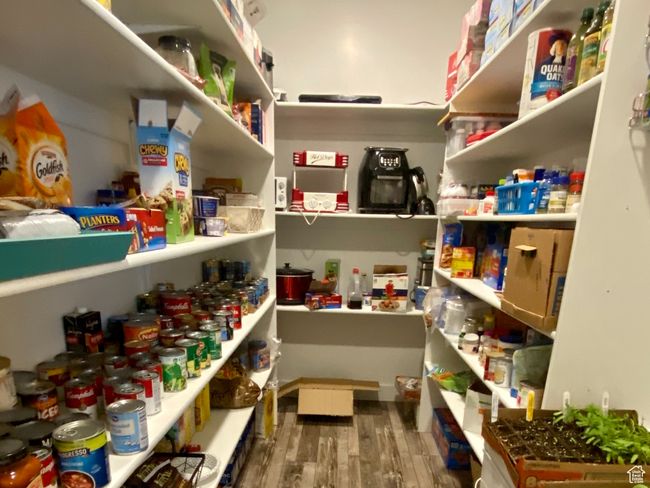 View of oversize walk in pantry | Image 26