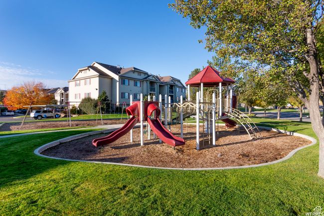 Community jungle gym with a yard | Image 21