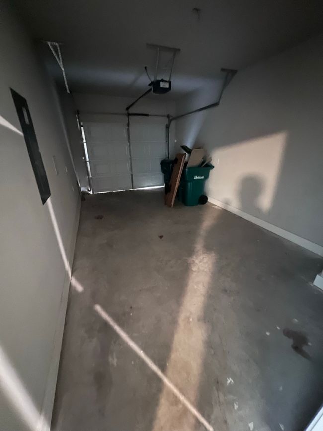 Garage featuring a garage door opener | Image 16
