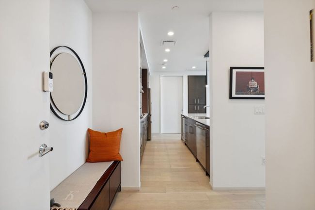 Corridor with a sink, recessed lighting, light wood-style floors, and baseboards | Image 6