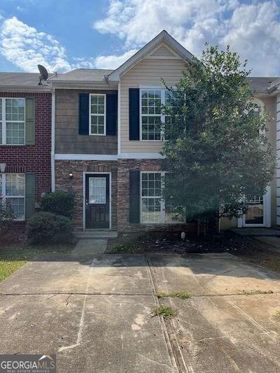 4008 Browne Court, Townhouse with 3 bedrooms, 2 bathrooms and 2 parking in Conley GA | Image 1