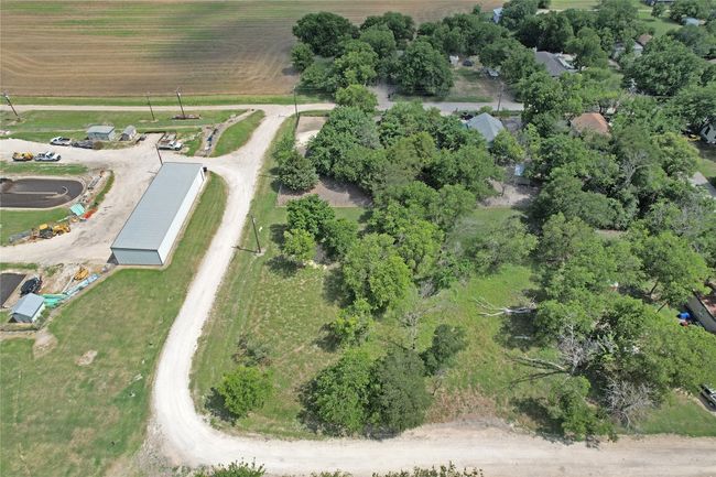 Aerial view of property and surrounding area with a tree filled landscape | Image 17
