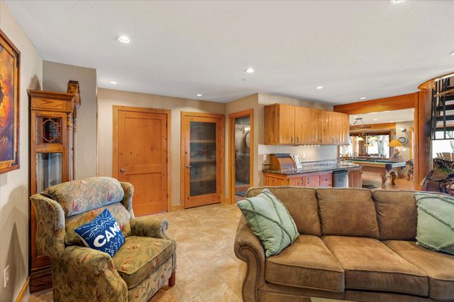 Lower level family area, entertaining, game, living room. | Image 72