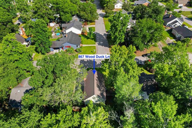 Aerial view of property's location with nearby suburban area | Image 35