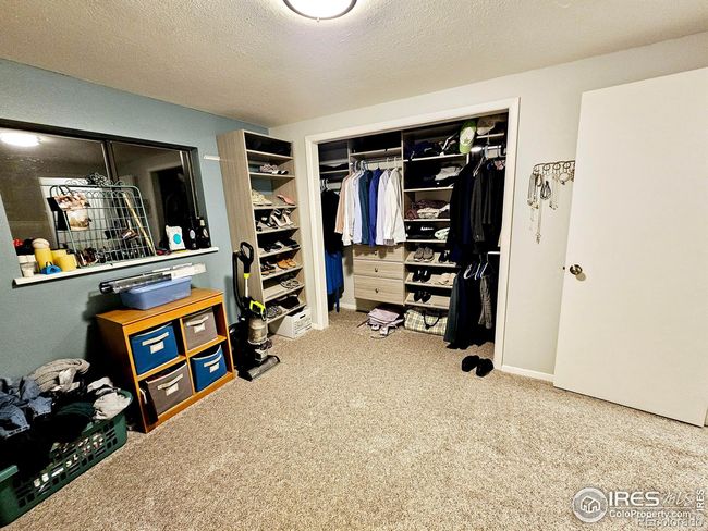 3rd bedroom with window to storage under the upstairs great room. | Image 26