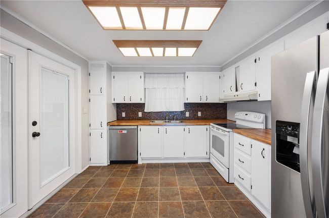 6027 Grand Oaks Dr Se, House other with 2 bedrooms, 2 bathrooms and null parking in WINTER HAVEN FL | Image 9