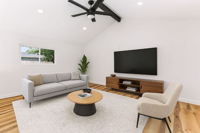 Living room featuring light wood-style flooring, recessed lighting, and ceiling fan | Image 17