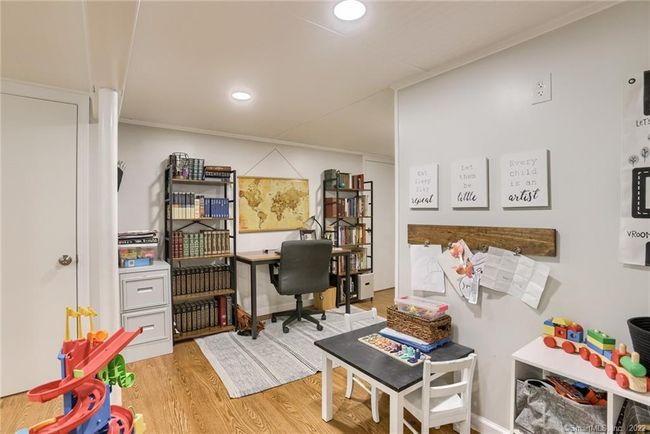Office/study area and Play area in lower level | Image 24