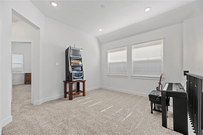 Versatile upstairs game room. | Image 18