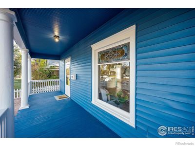 Front porch/deck, brand new exterior paint, gorgeous stained glass window | Image 3