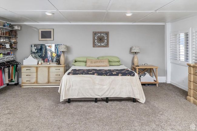 Bedroom featuring carpet flooring | Image 19