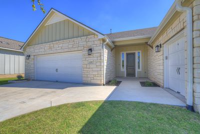 2 car garage w/ additional golf cart garage | Image 2